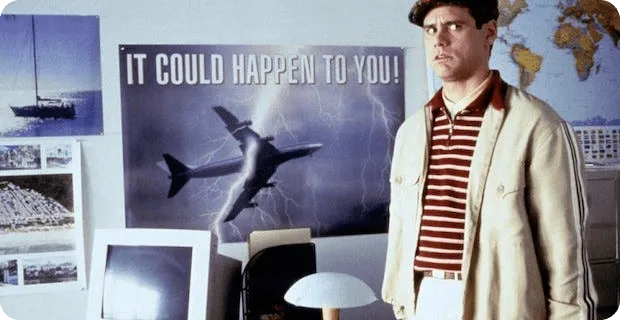 Scene from the film 'Liar, Liar" with Jim Carrey at a travel agency.